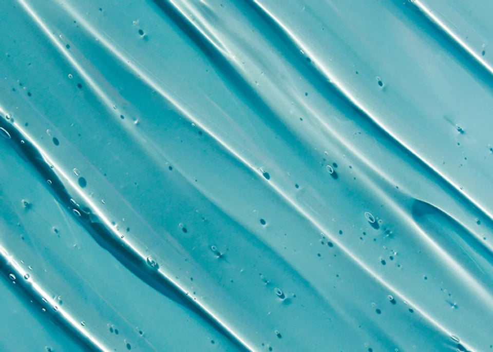 Shampoo texture serum on blue background