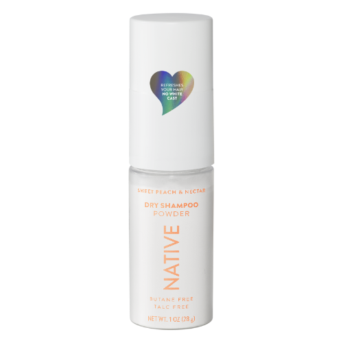 Native Dry Shampoo Powder in Sweet Peach & Nectar scent, shown in a white cylindrical bottle with a matching cap on a solid white background.